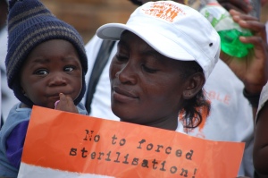 Women and baby marching for an end to forced sterilization